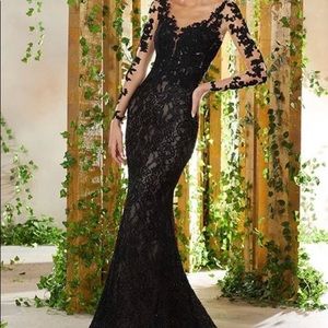 Size 8 MGNY for Morilee gown in black lace/nude long sleeve open back.